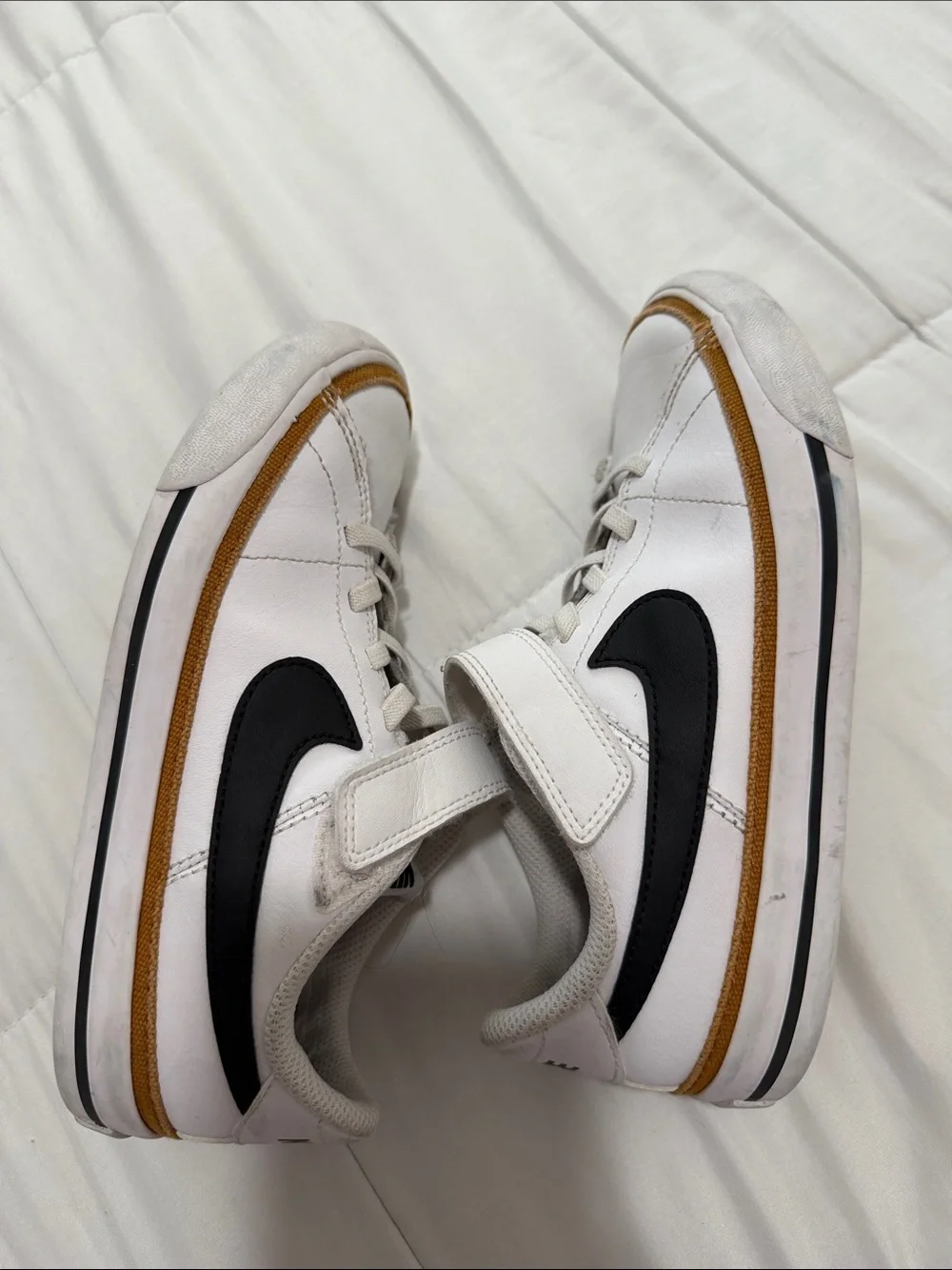 Nike White Kids Sneakers with Black Swoosh and Brown Trim